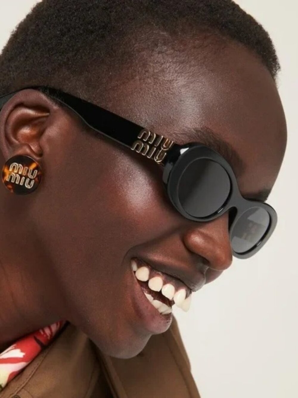 MIU MIU MU06ZS 1AB5S0 BLACK OVAL SUNGLASSES